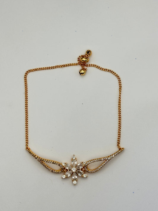 pulsera de flor con alas abiertas