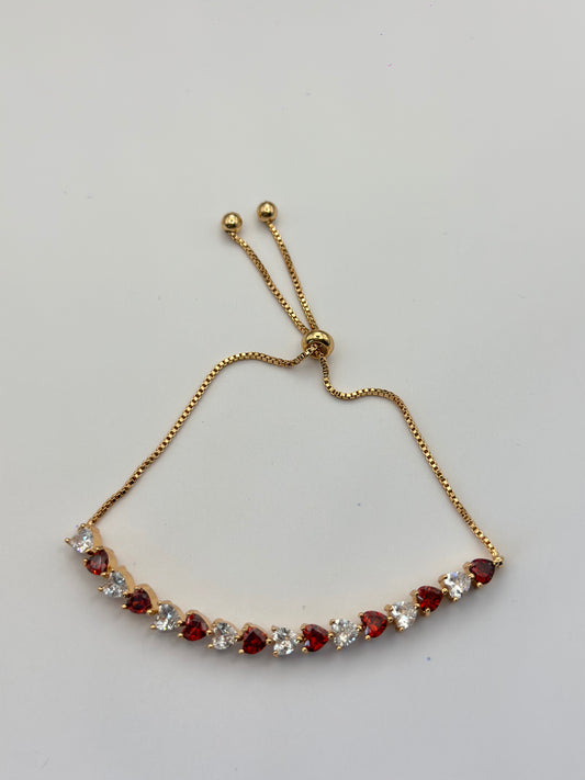 pulsera de corazones bicolor