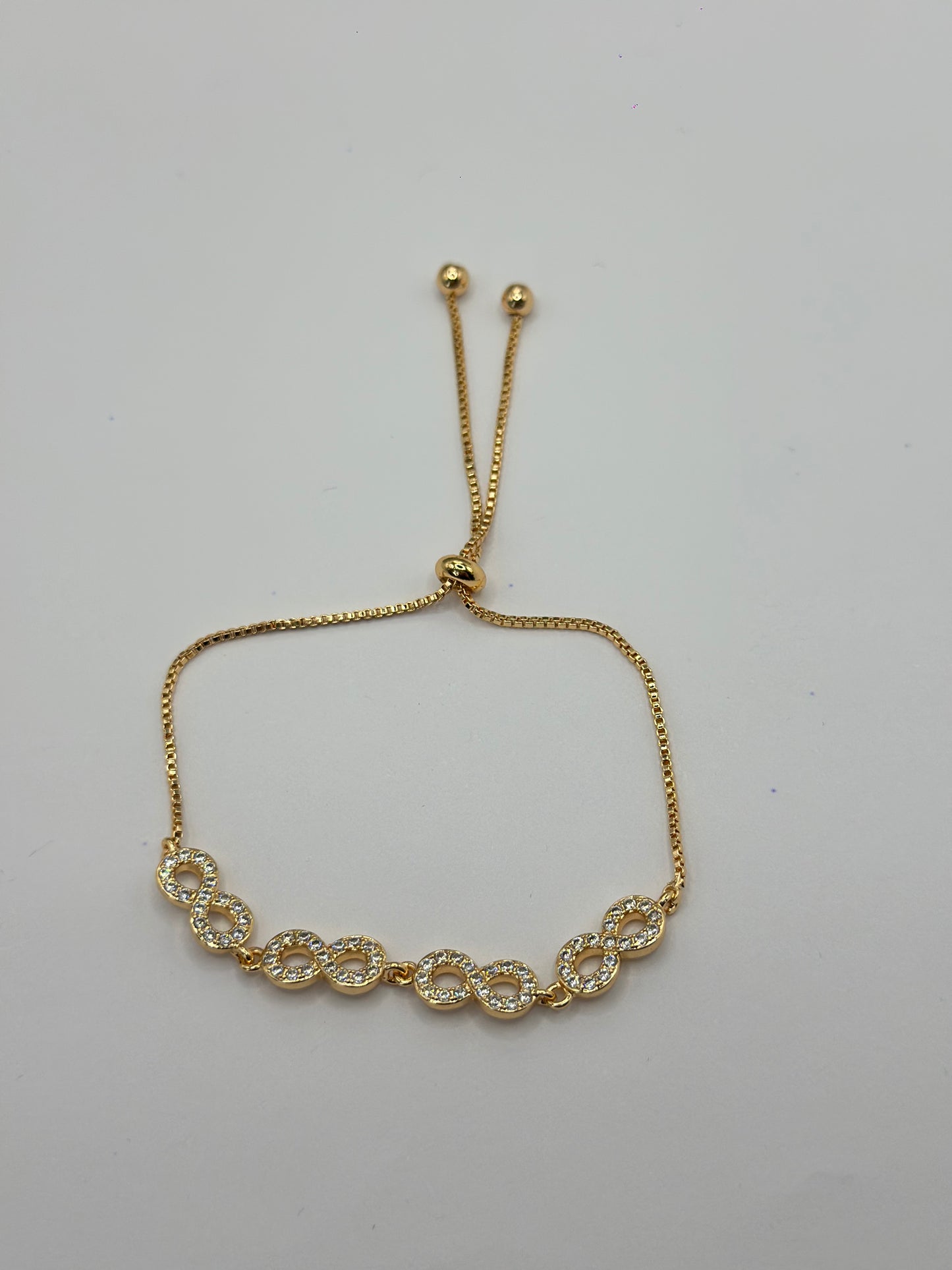 PULSERA AJUSTABLE INFINITO DE 4 PAVE
