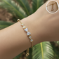PULSERA AJUSTABLE MOÑOS COQUETTE