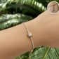 pulsera con charm de tubo