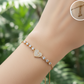 pulsera de doble corazón entrelazado