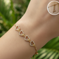 Pulsera ajustable cuatro corazones