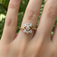 ANILLO OJO  CON PIEDRAS BRILLANTES