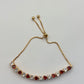 pulsera  de corazones bicolor