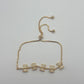 Pulsera ajustable de moños brillantes