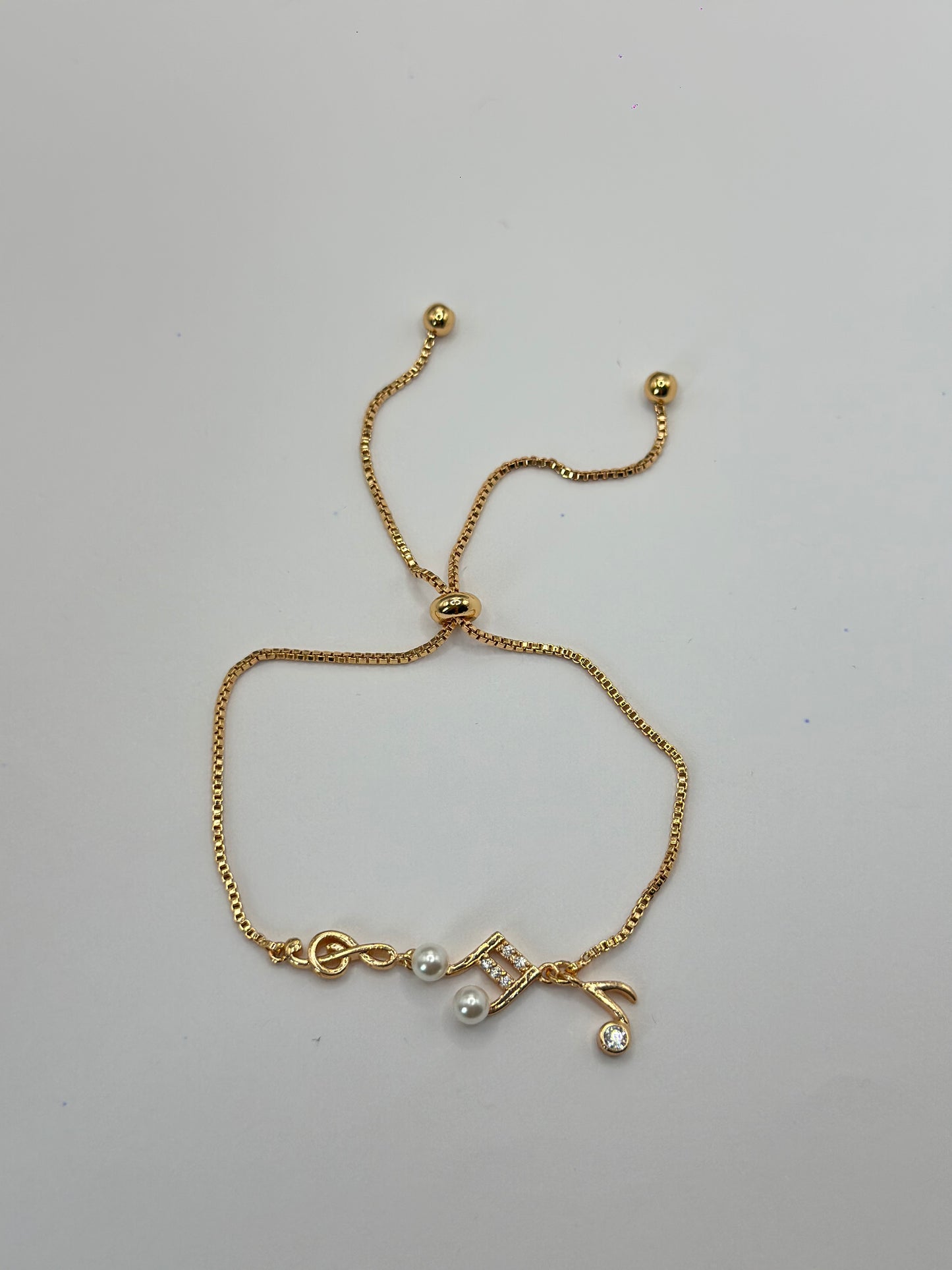 PULSERA AJUSTABLE MELODIA DORADA