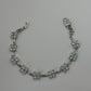 PULSERA FLORES BRILLANTES TENNIS