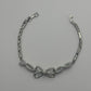 PULSERA MOÑO COQUETTE