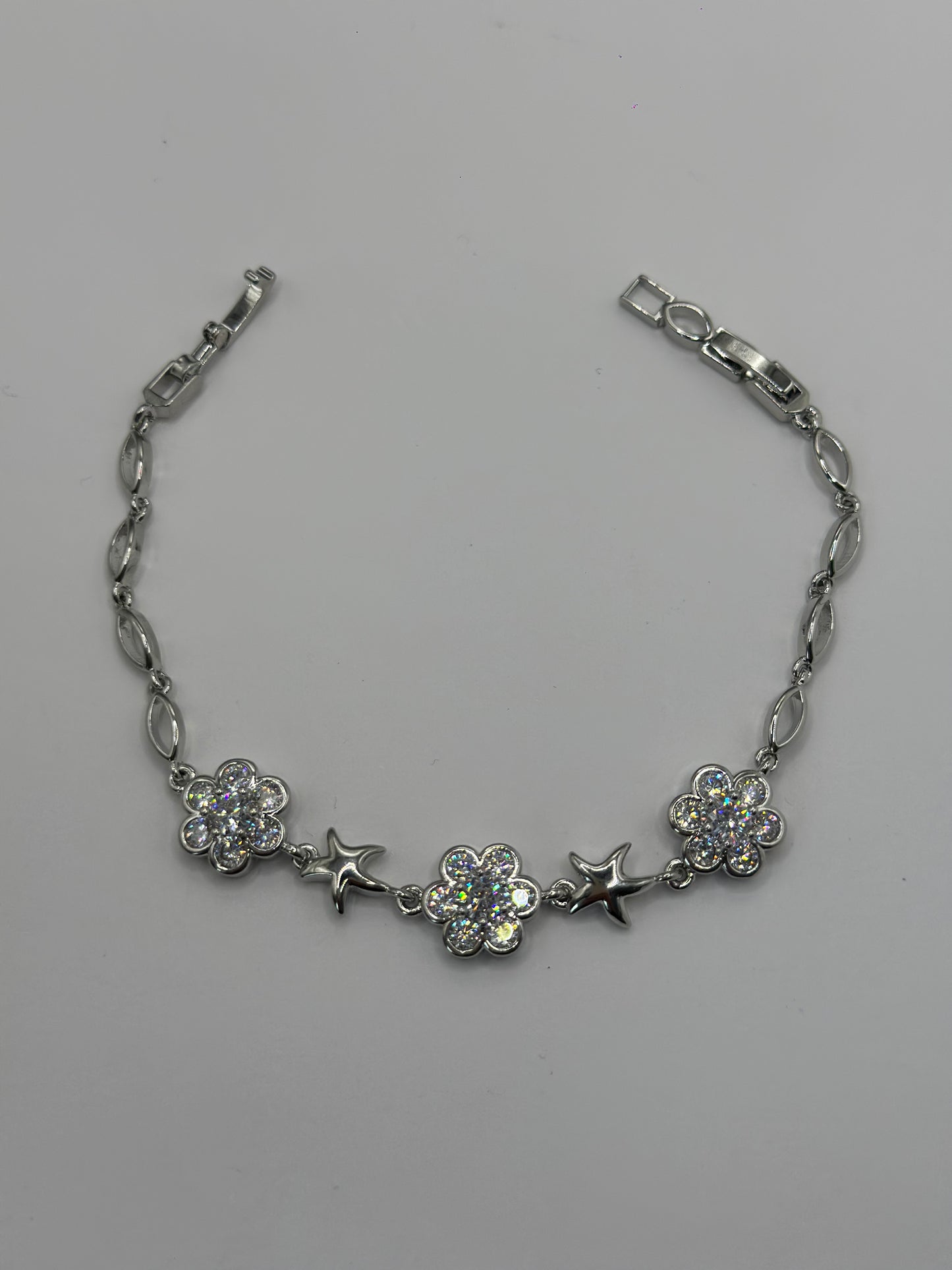 PULSERA ESTRELLAS Y FLORES PAVÉ