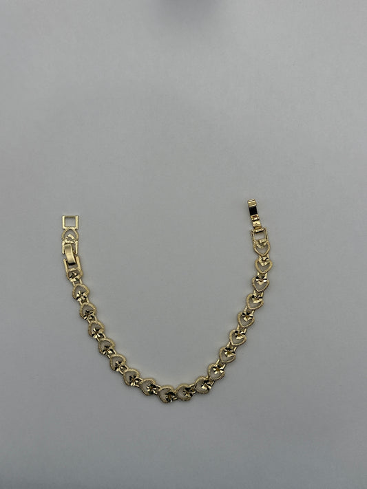 Pulsera de Corazones Calados con Corte Diamante