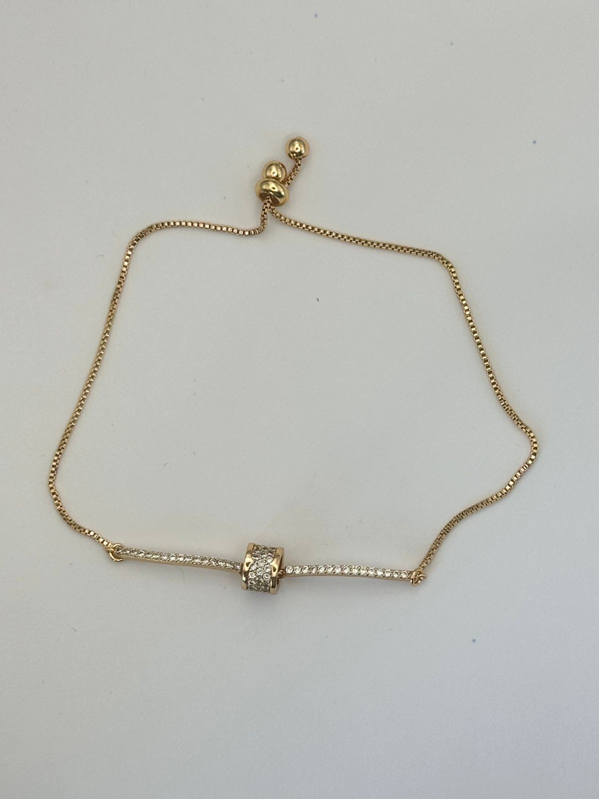 pulsera con charm de tubo